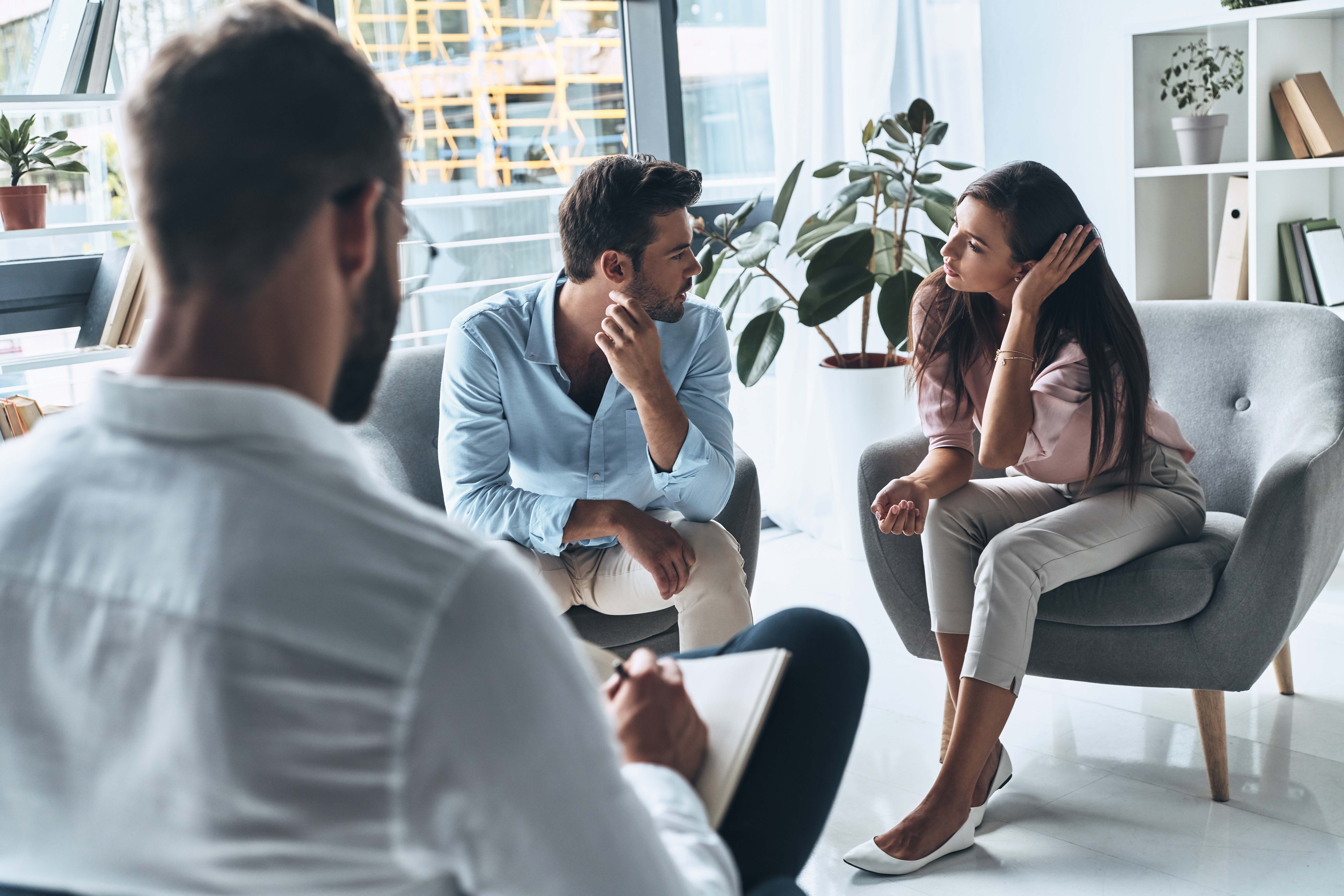 Couples working through conflict in an intensive therapy session